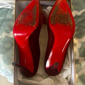 Red bottoms size 38.5 worn